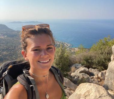 Ella Syvret rock climbing