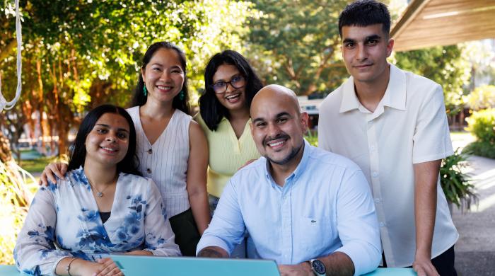 students sitting outdoors